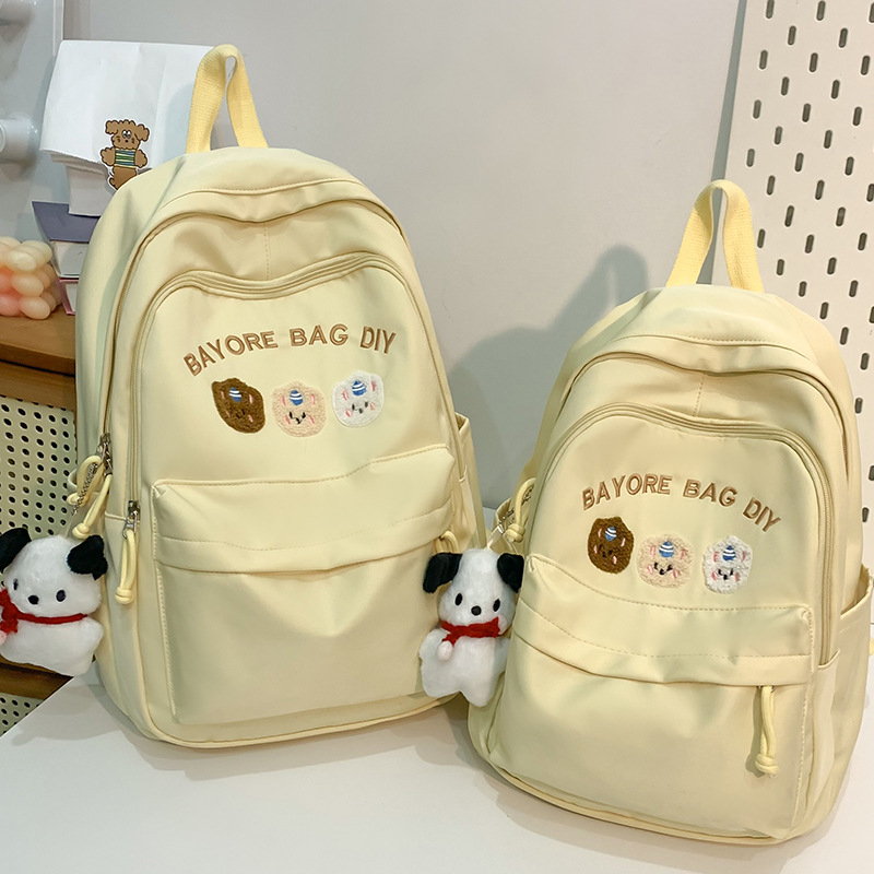 Školský batoh s písmenovým vzorom, nylon, priedušný, mestský minimalistický štýl, jar 2025