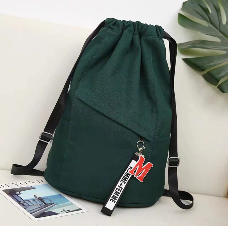 Unisex platneni ruksak sa šnuralom za sport i putovanja, kapacitet 36–55 L, proširiv, zakrivljene naramenice.