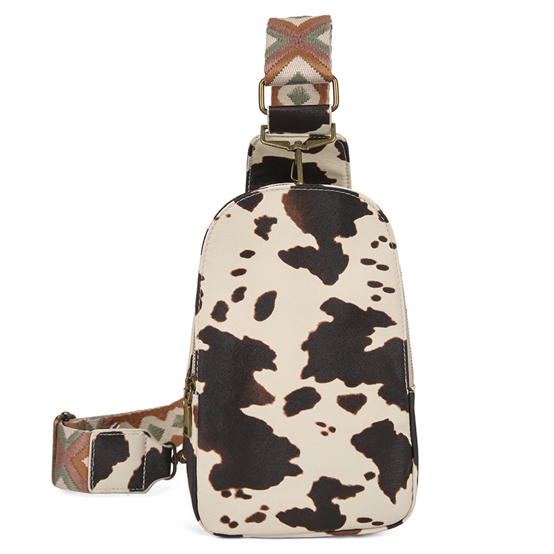 Ženska crossbody torba — PU materijal, školjkast oblik, podstava od poliestera, zatvaranje na zip, unutarnje pregrade: džep sa zipom, džep za telefon, džep za prijenosno računalo