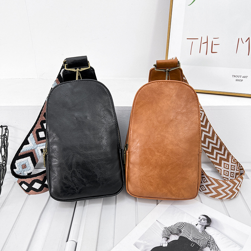 Ženska crossbody torba — PU materijal, školjkast oblik, podstava od poliestera, zatvaranje na zip, unutarnje pregrade: džep sa zipom, džep za telefon, džep za prijenosno računalo