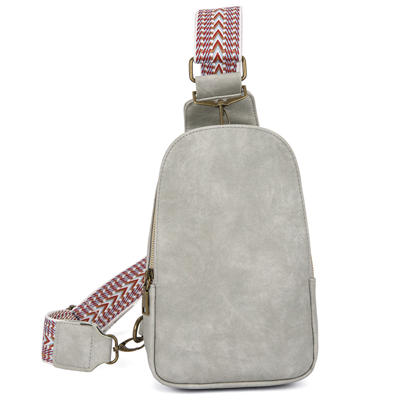 Ženska crossbody torba — PU materijal, školjkast oblik, podstava od poliestera, zatvaranje na zip, unutarnje pregrade: džep sa zipom, džep za telefon, džep za prijenosno računalo