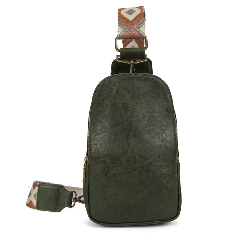 Ženska crossbody torba — PU materijal, školjkast oblik, podstava od poliestera, zatvaranje na zip, unutarnje pregrade: džep sa zipom, džep za telefon, džep za prijenosno računalo