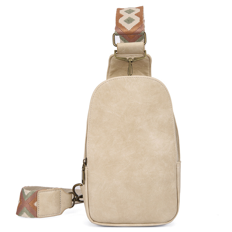 Ženska crossbody torba — PU materijal, školjkast oblik, podstava od poliestera, zatvaranje na zip, unutarnje pregrade: džep sa zipom, džep za telefon, džep za prijenosno računalo