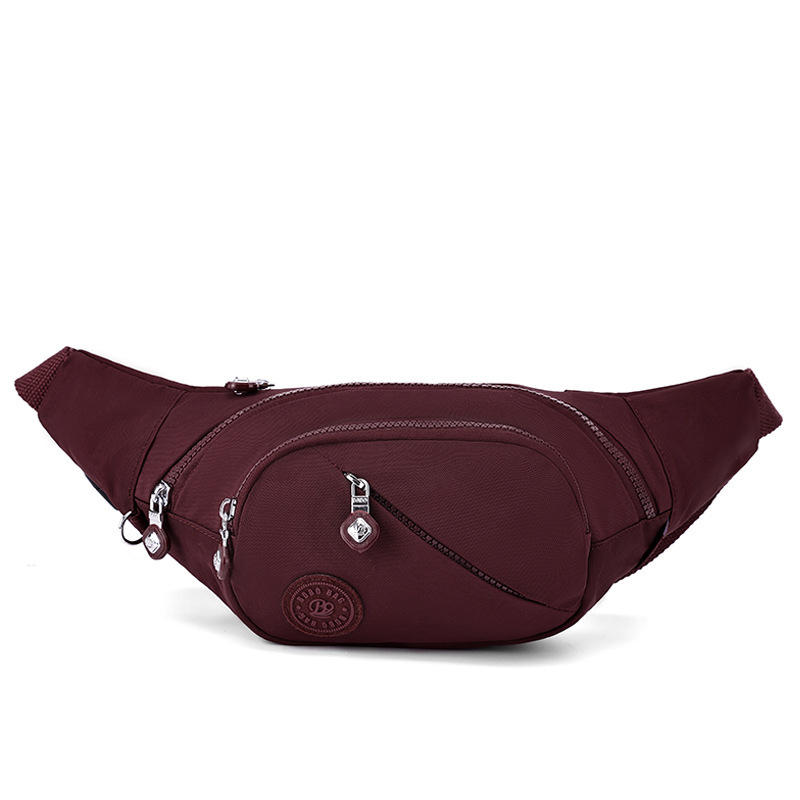 Hibridinė krūtinės/juosmens rankinė telefonui — išorė nailonas, vidus medvilnė, užtrauktukas, vidinės kišenės telefonui ir dokumentams