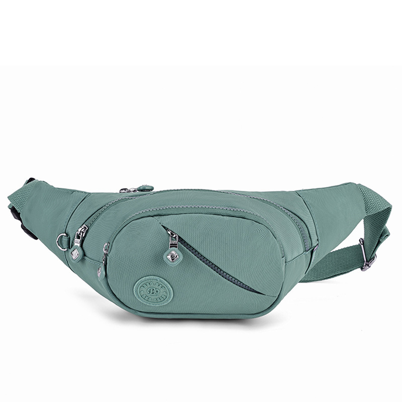 Hibridinė krūtinės/juosmens rankinė telefonui — išorė nailonas, vidus medvilnė, užtrauktukas, vidinės kišenės telefonui ir dokumentams