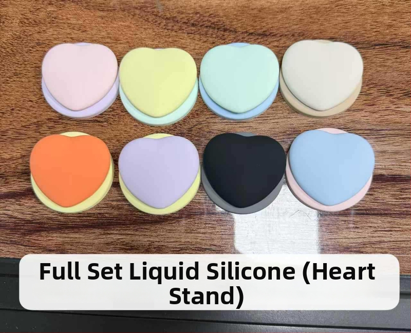 Sirds formas telefona turētājs no pilnīga šķidrā silikona, FG-85536; saderīgs ar Apple; magnētiska piestiprināšana visiem tālruņiem; pielāgošana pieejama