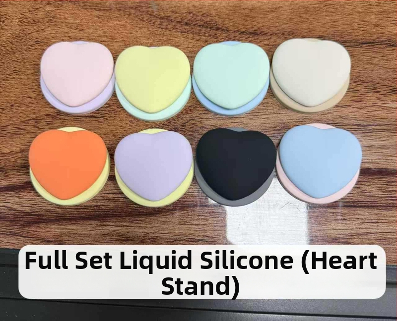 Sirds formas telefona turētājs no pilnīga šķidrā silikona, FG-85536; saderīgs ar Apple; magnētiska piestiprināšana visiem tālruņiem; pielāgošana pieejama