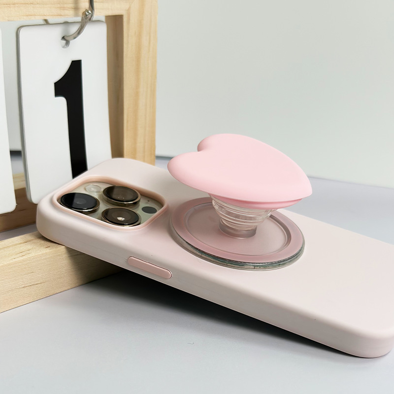 Snap-on silikona tālruņa statīvs, modelis X-113, savietojams ar iPhone 12–15, magnētiskais MagSafe, salokāms.