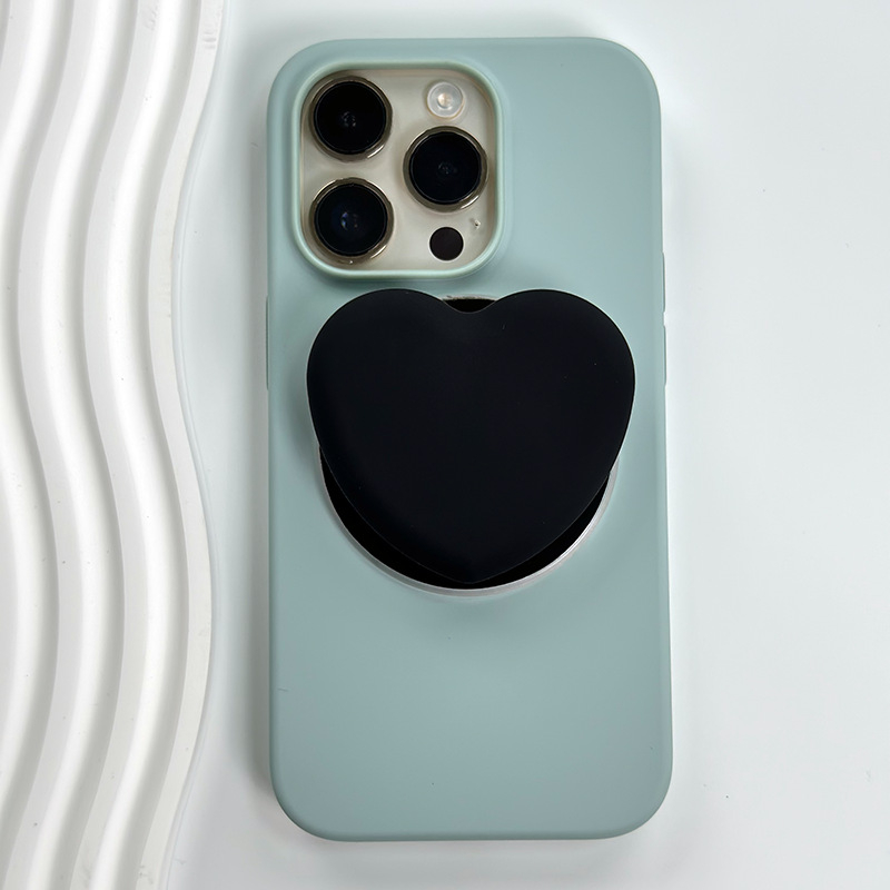 Snap-on silikona tālruņa statīvs, modelis X-113, savietojams ar iPhone 12–15, magnētiskais MagSafe, salokāms.