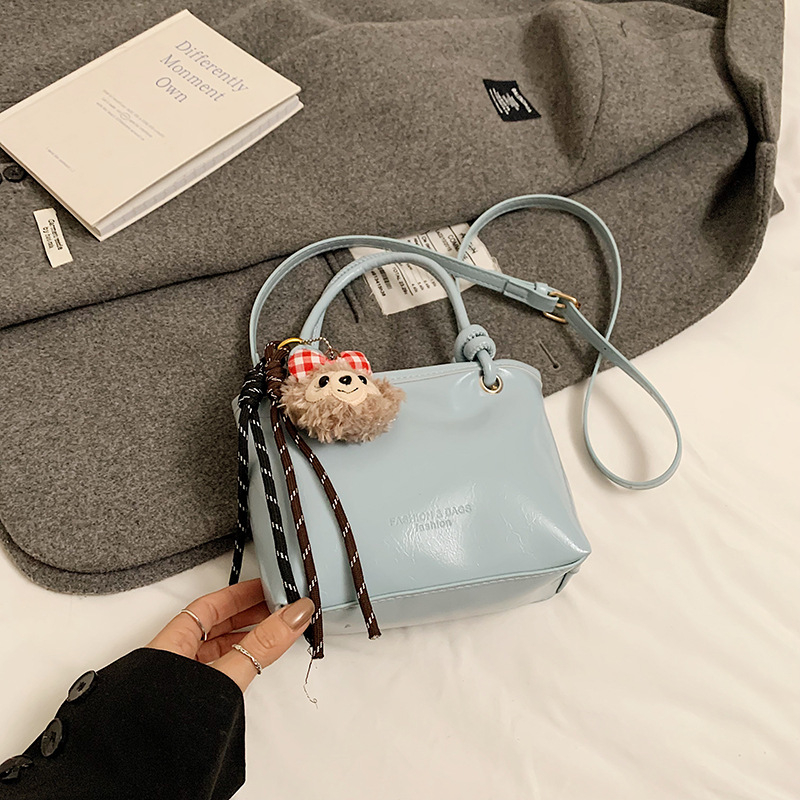 Bucket torba, PU materijal, gradski stil, crossbody dizajn, zatvarač, poliester podstava, unutarnji džep za mobitel