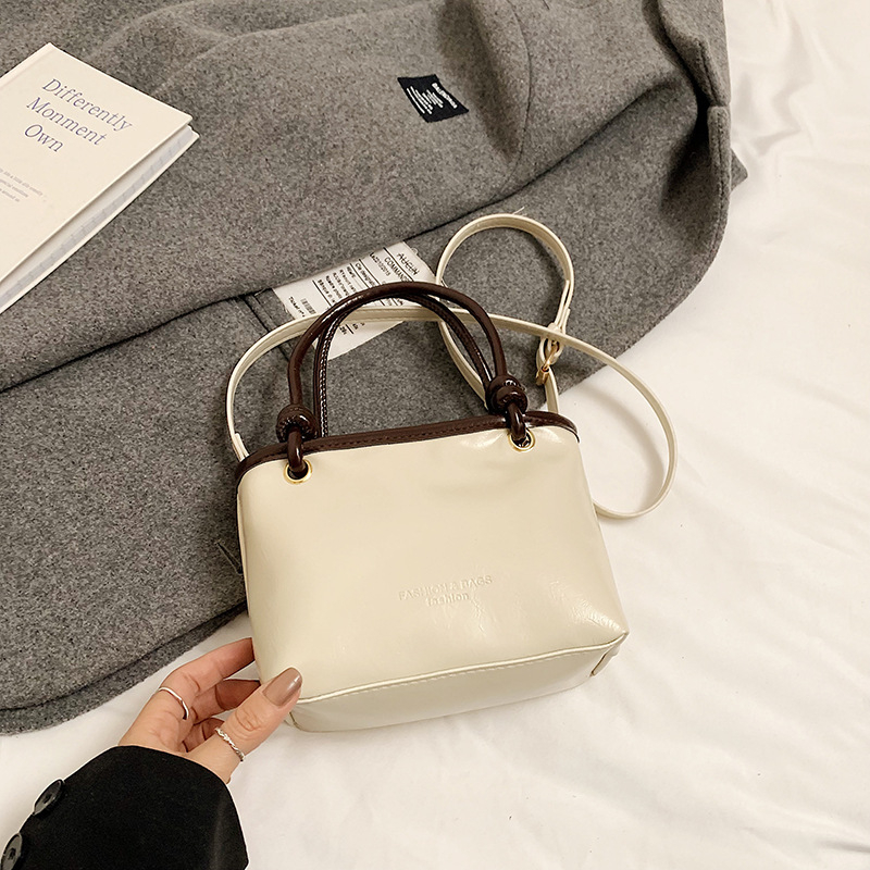 Bucket torba, PU materijal, gradski stil, crossbody dizajn, zatvarač, poliester podstava, unutarnji džep za mobitel