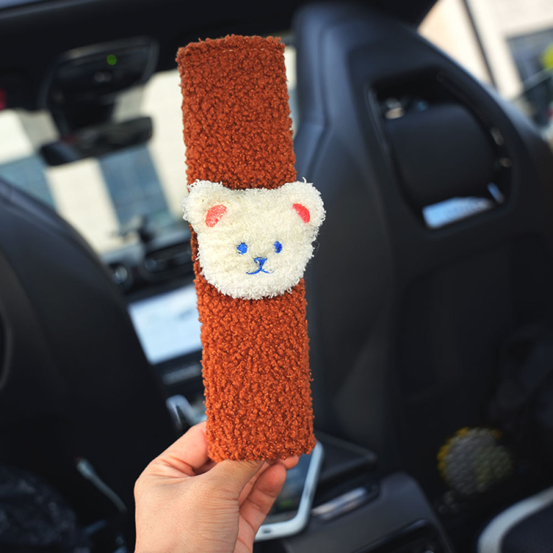 Auto jostas pārklājs – pūkains karikatūru dekors (poliesteris; svars ~35 g; pielāgošana pieejama; Piederums: bērnu drošības jostas pārklājs)