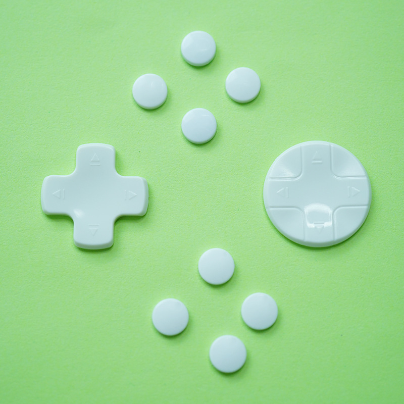 Pokrovky tlačidiel Switch Joy-Con pre D-pad kríž a kruhové tlačidlo (ABS, model aksw-016, 20 g)