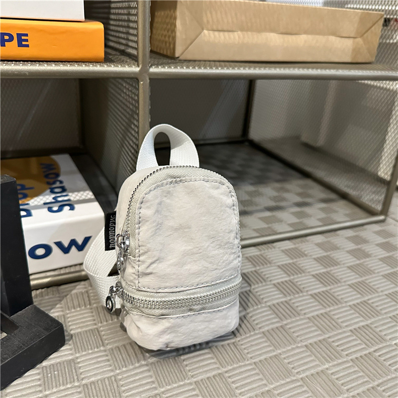 Unisex ruksak od najlona, japanskog stila casual, kapacitet 20–35L, zakrivljene naramenice, podstava od poliestera