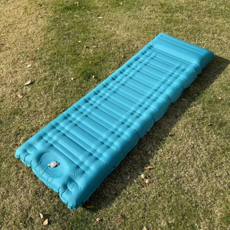 Lauko nešiojamas pripučiamas čiužinys - paviršius iš kompozicinės medžiagos; nešiojamas; su pėdos pompa (Paviršius: kompozicinė medžiaga; Kategorija: pripučiamas čiužinys)