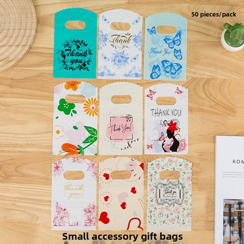 Plastikiniai dovanų maišeliai juvelyriniams dirbiniams — dviejų sluoksnių, kilmės Yiwu (Zhejiang), Tonghong prekės ženklas, dienos talpa 100000.