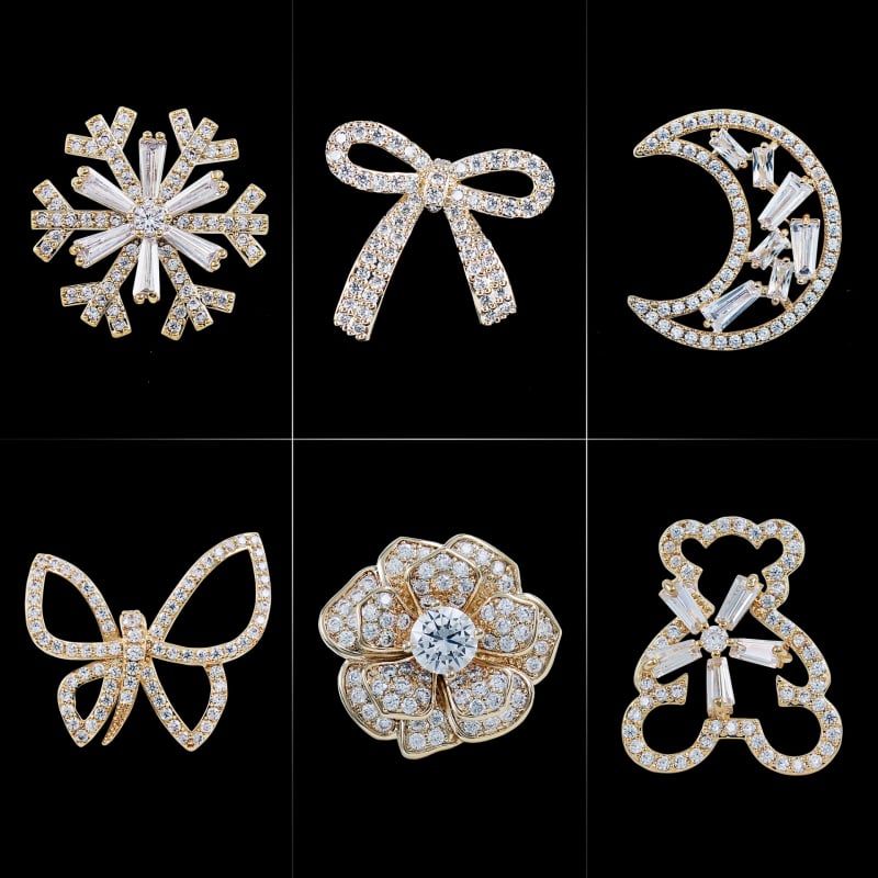 Rézből készült brooch cirkóniával, masni motívum, hópehely, mikroinlay