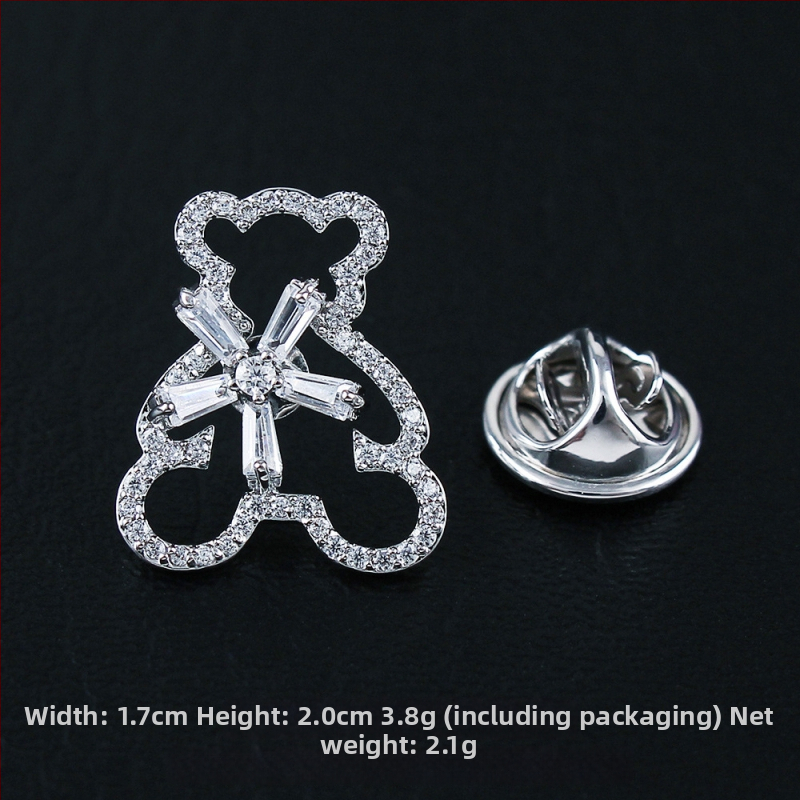 Rézből készült brooch cirkóniával, masni motívum, hópehely, mikroinlay