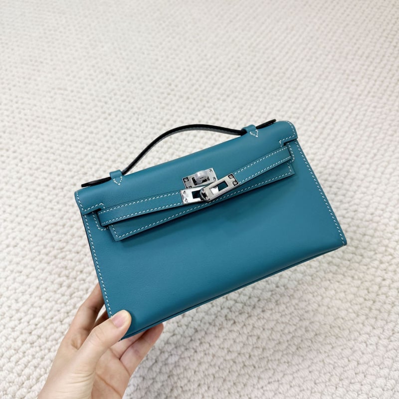 Geantă Kelly, stil urban minimalist, piele Swift top-grain autentică (din primul strat de piele de vacă), închidere cu lacăt, curea crossbody cu o singură curea, buzunar pentru telefon și buzunar pentru ID