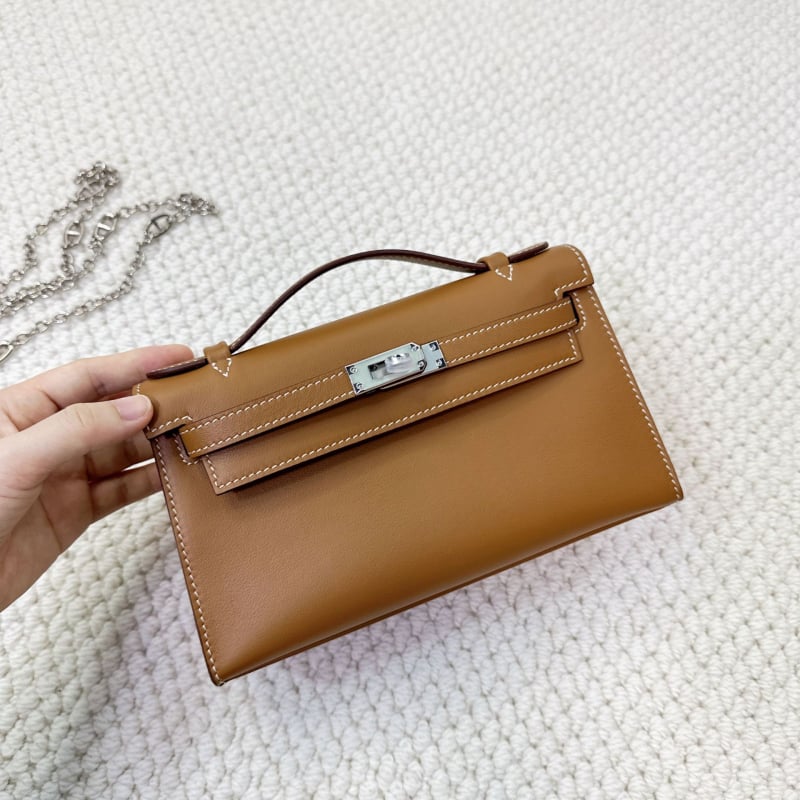 Geantă Kelly, stil urban minimalist, piele Swift top-grain autentică (din primul strat de piele de vacă), închidere cu lacăt, curea crossbody cu o singură curea, buzunar pentru telefon și buzunar pentru ID