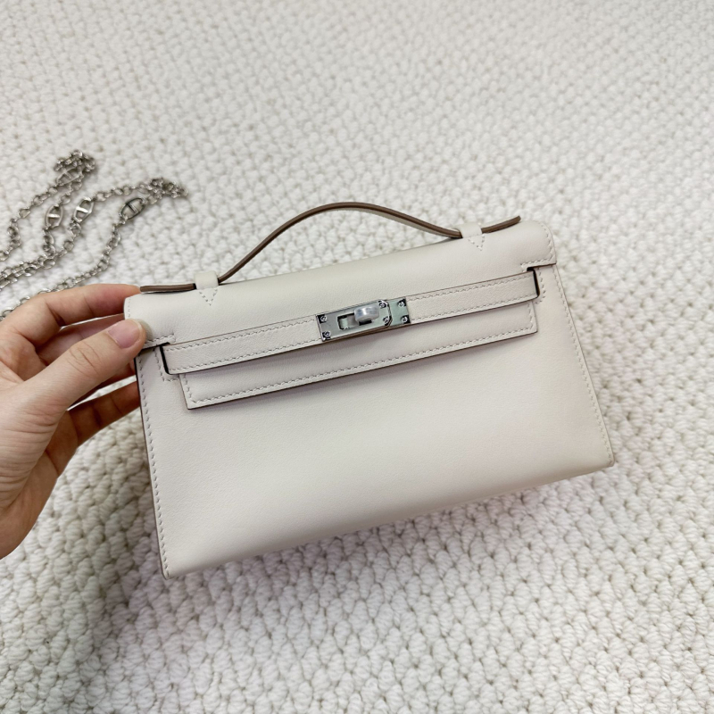 Geantă Kelly, stil urban minimalist, piele Swift top-grain autentică (din primul strat de piele de vacă), închidere cu lacăt, curea crossbody cu o singură curea, buzunar pentru telefon și buzunar pentru ID