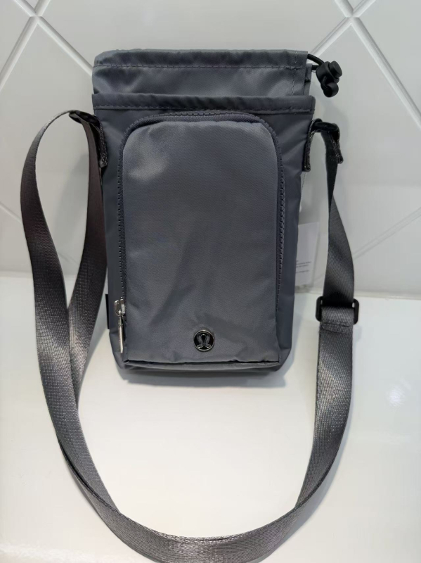 Geantă crossbody din nylon pentru sticla de apă, cu buzunar pentru telefon, cilindrică, impermeabilă, pentru alergare și activități în aer liber