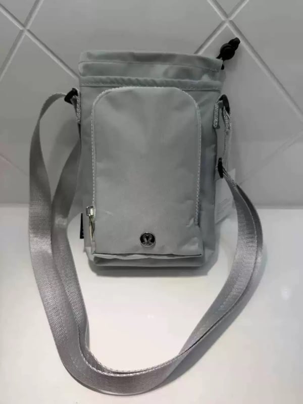 Geantă crossbody din nylon pentru sticla de apă, cu buzunar pentru telefon, cilindrică, impermeabilă, pentru alergare și activități în aer liber