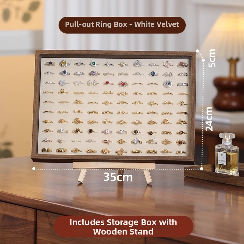 Fa gyűrűk kiállító doboz – 100 gyűrű kapacitás, téglalap alakú, diófurnér borítással, egy rétegű