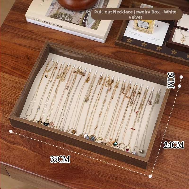 Fa gyűrűk kiállító doboz – 100 gyűrű kapacitás, téglalap alakú, diófurnér borítással, egy rétegű