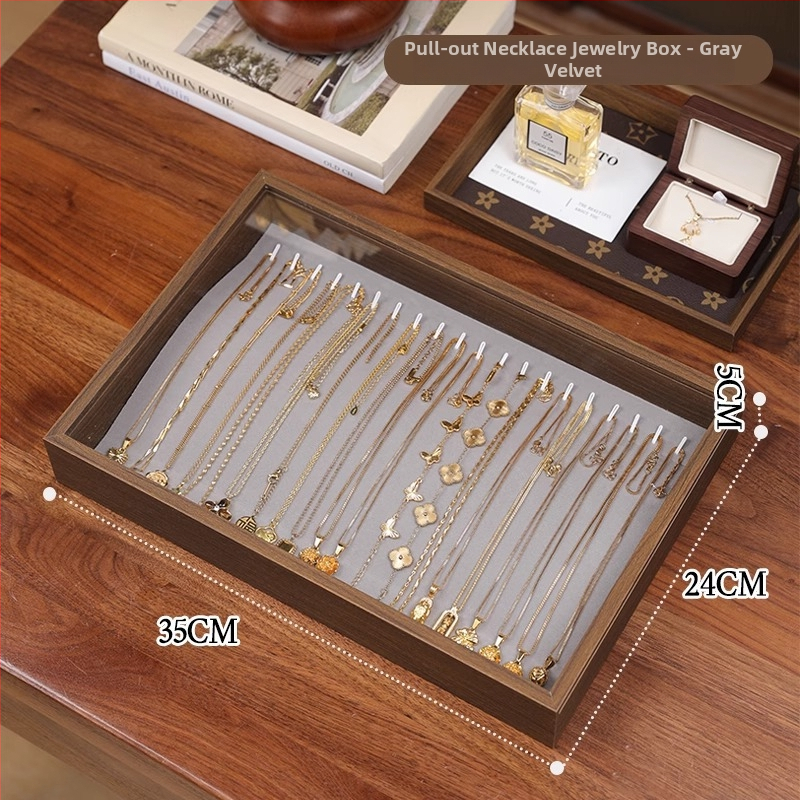 Fa gyűrűk kiállító doboz – 100 gyűrű kapacitás, téglalap alakú, diófurnér borítással, egy rétegű