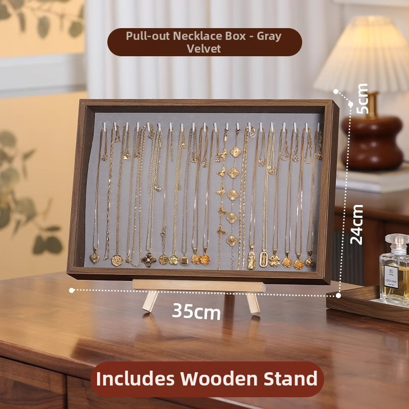 Fa gyűrűk kiállító doboz – 100 gyűrű kapacitás, téglalap alakú, diófurnér borítással, egy rétegű