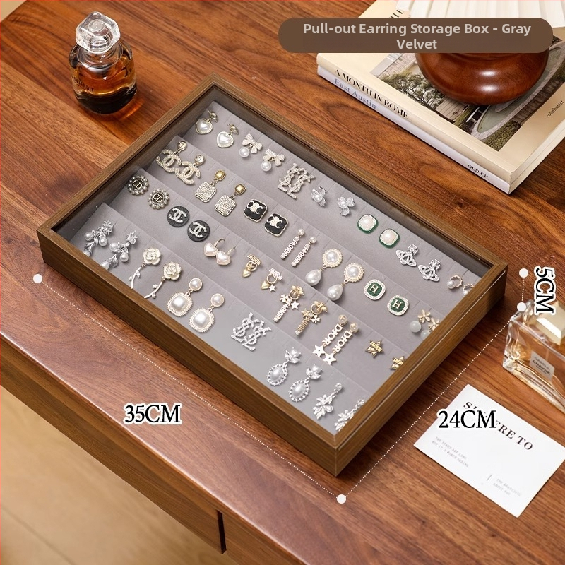 Fa gyűrűk kiállító doboz – 100 gyűrű kapacitás, téglalap alakú, diófurnér borítással, egy rétegű