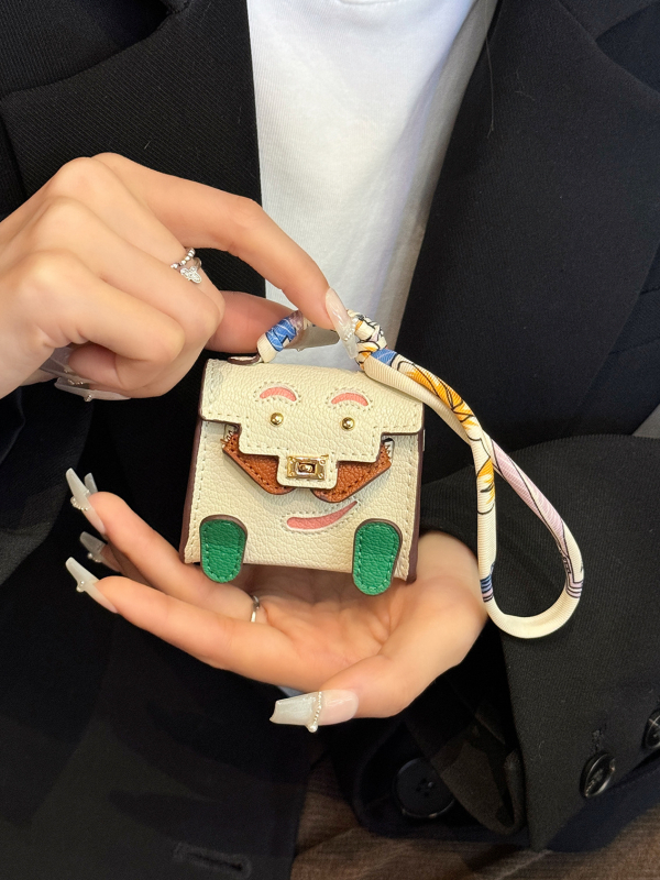 Ādas aizsargkārbiņa AirPods Pro 2 ar mini piekariņu karabīnei, karikatūru dizains, holster stils, daudzfunkcionāls, pārnēsājams; saderīgs ar Apple, OPPO, VIVO