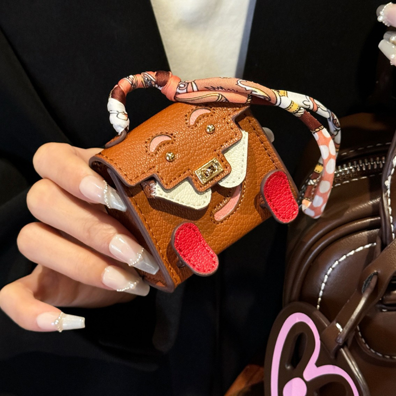 Ādas aizsargkārbiņa AirPods Pro 2 ar mini piekariņu karabīnei, karikatūru dizains, holster stils, daudzfunkcionāls, pārnēsājams; saderīgs ar Apple, OPPO, VIVO