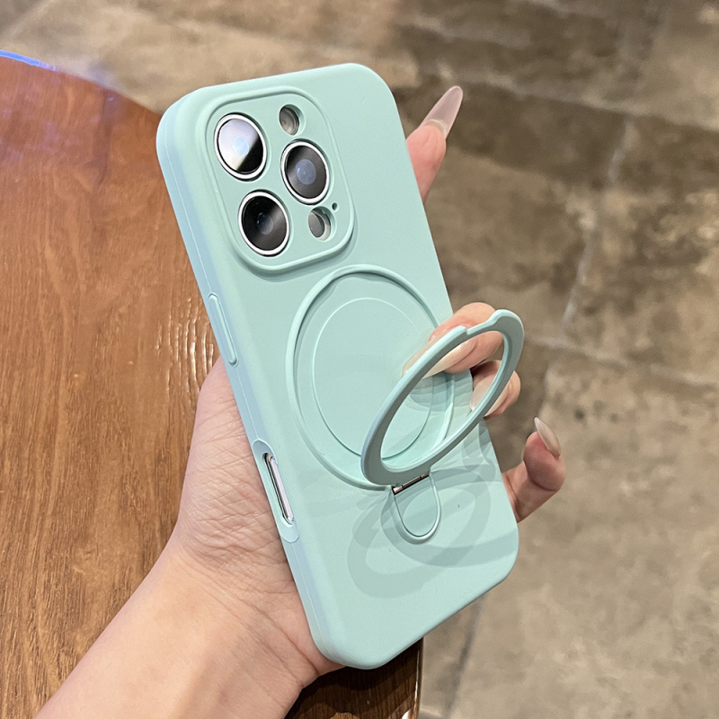 Korpuss no šķidrā silikona iPhone 17 Pro Max ar integrētu magnētisko statīvu un kritiena aizsardzību, ziemeļniecisks stil.