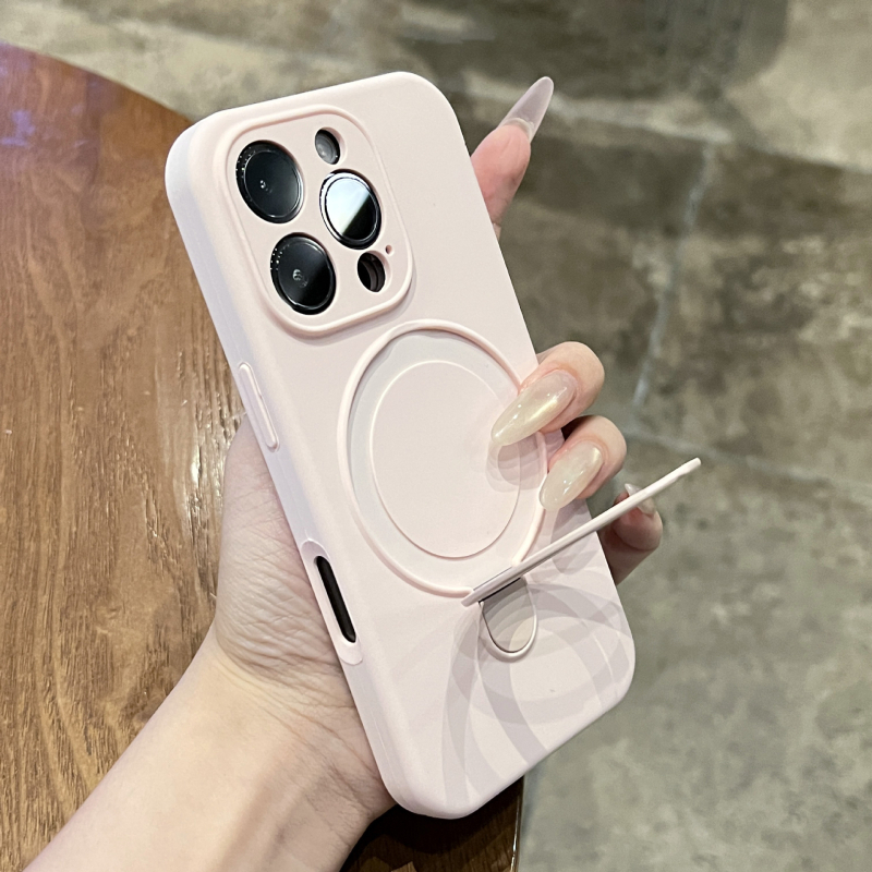 Korpuss no šķidrā silikona iPhone 17 Pro Max ar integrētu magnētisko statīvu un kritiena aizsardzību, ziemeļniecisks stil.