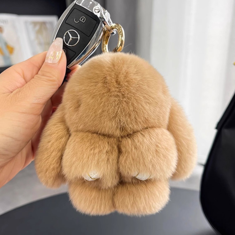 Privjesak od prave kože - plišani zeko, privjesak za telefon i torbu, polukruhna izrada, zima 2024, crtani stil, motiv malog životinjskog oblika