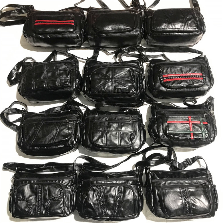 Női PU oldaltáska — vízszintes négyszög alak, cipzáras záródás, poliészter bélés, belső zsebek: cipzáras zseb, telefonzseb, személyi igazolvány zseb, kamera zseb