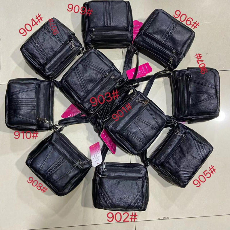 Női PU oldaltáska — vízszintes négyszög alak, cipzáras záródás, poliészter bélés, belső zsebek: cipzáras zseb, telefonzseb, személyi igazolvány zseb, kamera zseb