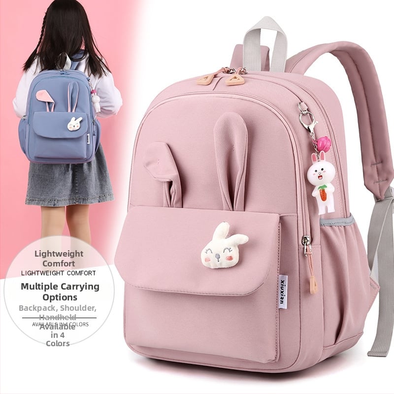 Mergaitėms skirta mokyklinė kuprinė iš nailono, vaikiško ir žaismingo stiliaus, skirta 1–2 klasei