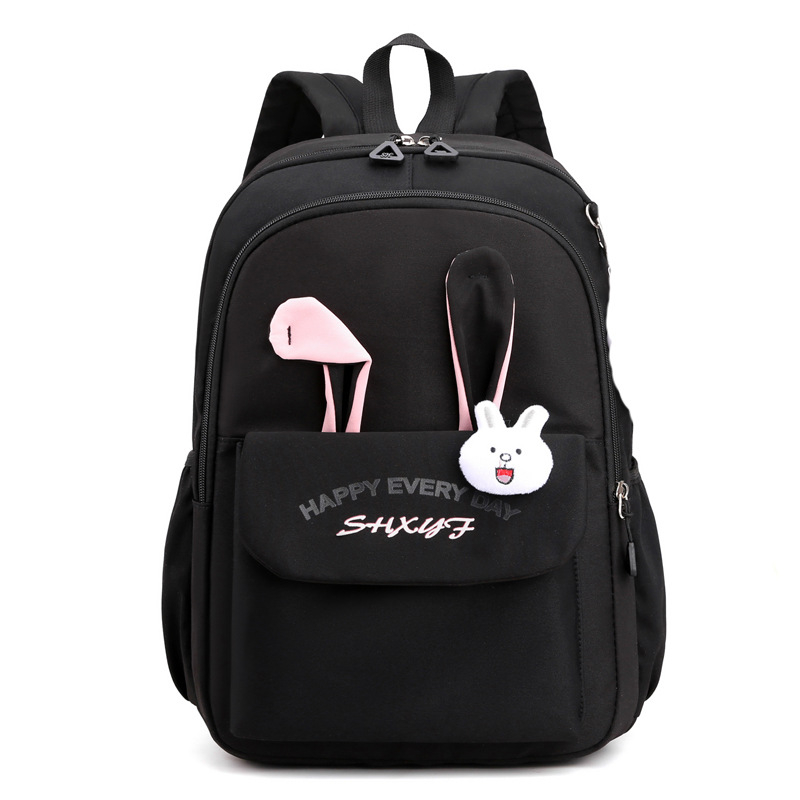 Mergaitėms skirta mokyklinė kuprinė iš nailono, vaikiško ir žaismingo stiliaus, skirta 1–2 klasei