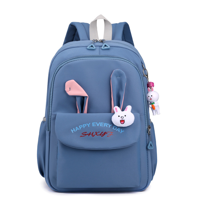 Mergaitėms skirta mokyklinė kuprinė iš nailono, vaikiško ir žaismingo stiliaus, skirta 1–2 klasei