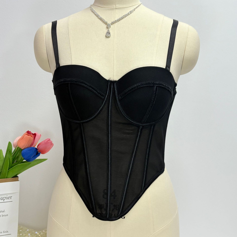 Žuvies kaulo Korsetas su tinkleliu – kvėpuojantis, keliamasis, 1/2 taurė, ploni formuojami tauriai, kempinės užpildas, nuimamieji petnešėlės