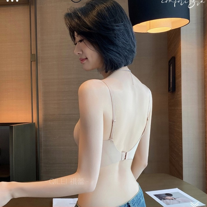 Grudnjak u stilu vest, bezšivan, s 3/4 košaricama, tankim oblikovanim čašicama, čvrste naramenice, stražnje kopčanje s tri reda kopči