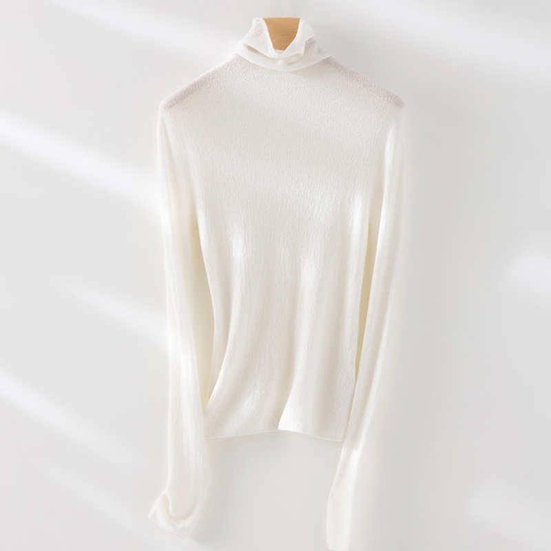 Pulover din cașmir fără cusături, guler înalt, croială slim, mâneci lungi, detalii patchwork; lungime normală 50–65 cm; cașmir 30–50%, mătase mulberry sub 30%; toamnă 2024