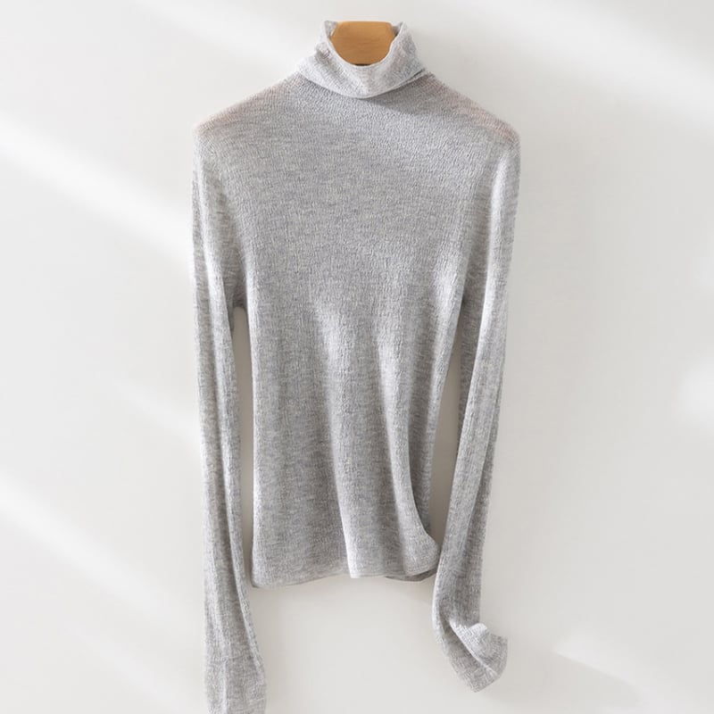 Pulover din cașmir fără cusături, guler înalt, croială slim, mâneci lungi, detalii patchwork; lungime normală 50–65 cm; cașmir 30–50%, mătase mulberry sub 30%; toamnă 2024