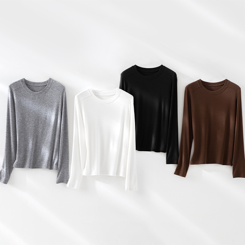 Pulover s okruglim izrezom, dugi rukavi, tanak Tencel-vuna smjesa, slobodan kroj, 70–80% Tencel, <30% vuna