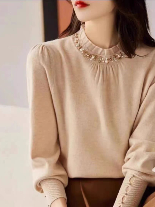 Pleten pulover s perlicama, slobodnog kroja, poluvisoki ovratnik i dugi rukavi