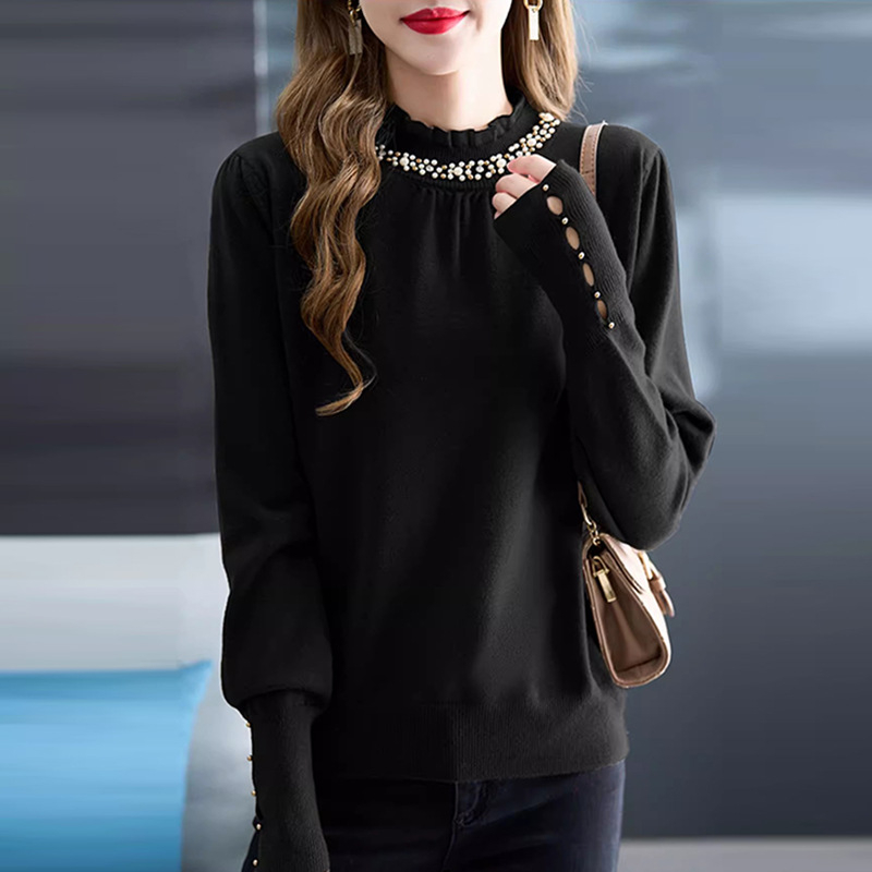 Pleten pulover s perlicama, slobodnog kroja, poluvisoki ovratnik i dugi rukavi