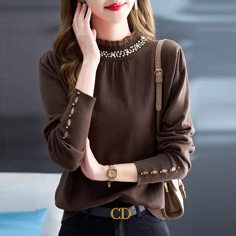 Pleten pulover s perlicama, slobodnog kroja, poluvisoki ovratnik i dugi rukavi